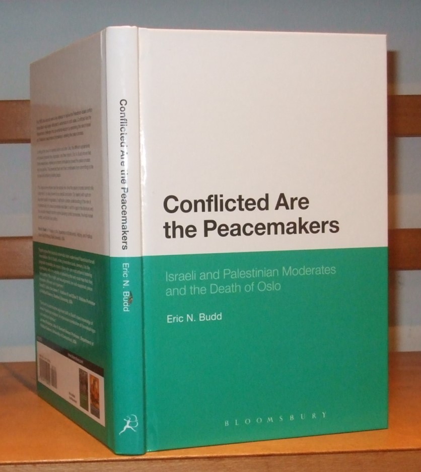 Image for Conflicted are the peacemakers; Israeli and Palestinian moderates and the death of Oslo.